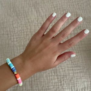 rainbow beads with a gold star